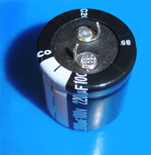 Foto Elektrolyt - Kondensator axial 2,2µF 100V 30x30mm