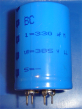 Elektrolyt - Kondensator radial 330 µF 385V 85C 4 Lötstifte